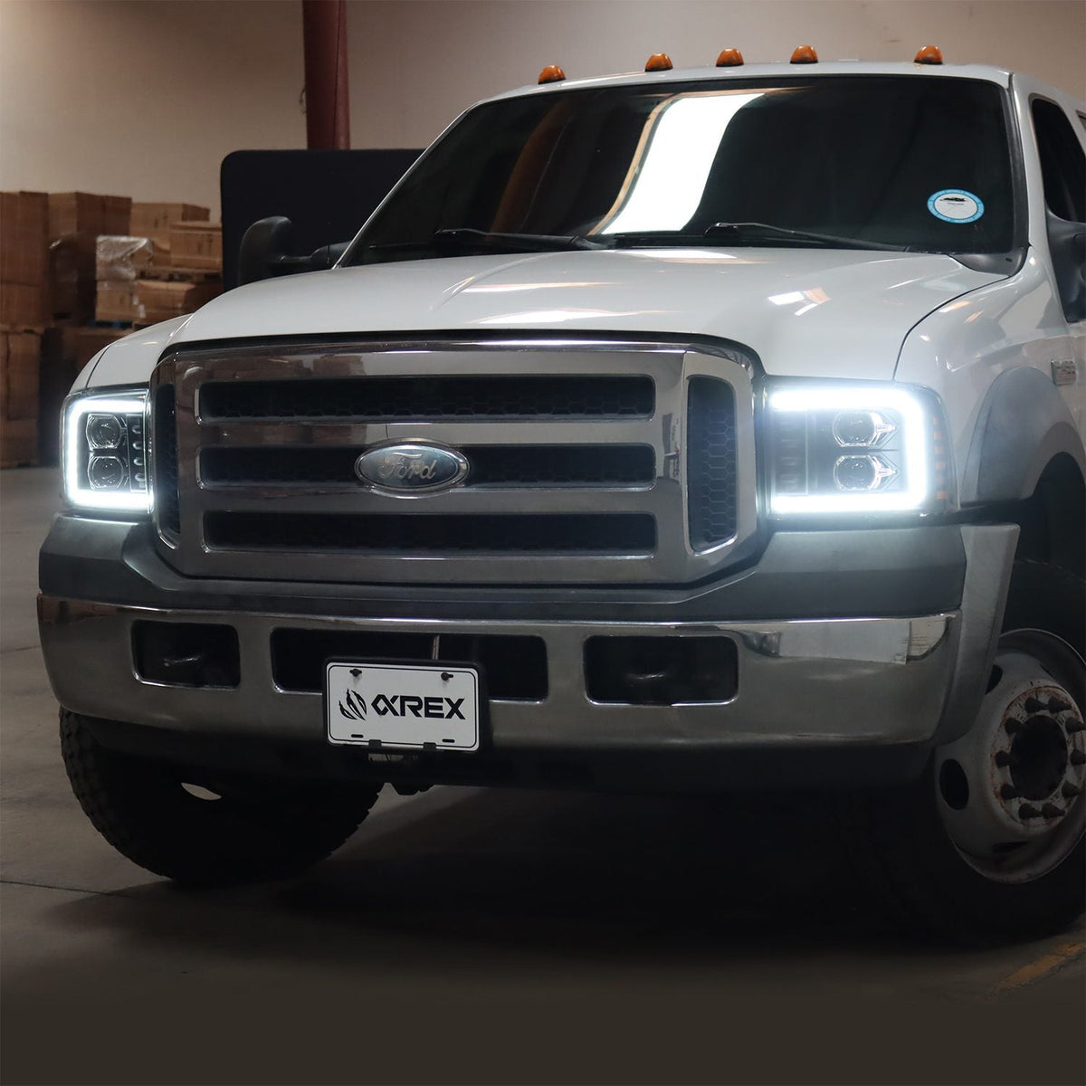 AlphaRex 880315 05-07 Ford F250/350/450/550 Super Duty PRO-Series Projector Headlights Black with Sequential Signal + SWB DRL
