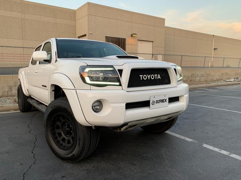 AlphaRex 880735 05-11 Toyota Tacoma LUXX Crystal Headlights Plank Style Design Black with Activation Light/DRL