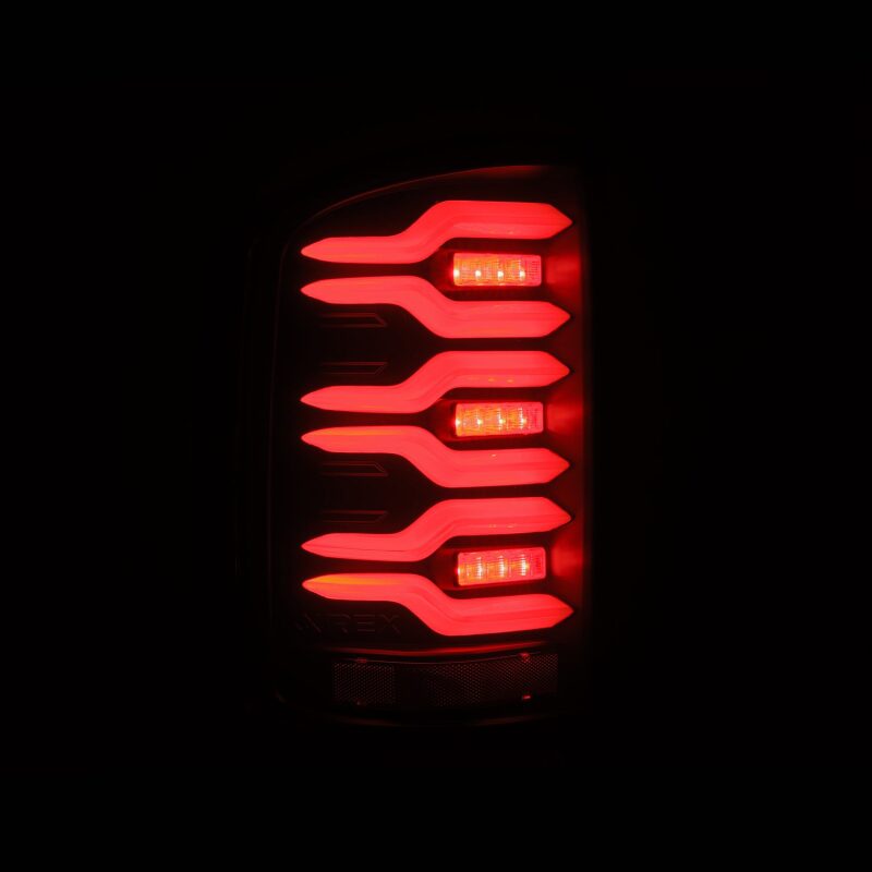 AlphaRex 630040 14-18 GMC Sierra 1500/2500 HD/3500 HD LUXX-Series LED Tail Lights Black w/Activation Light & Sequential Signal