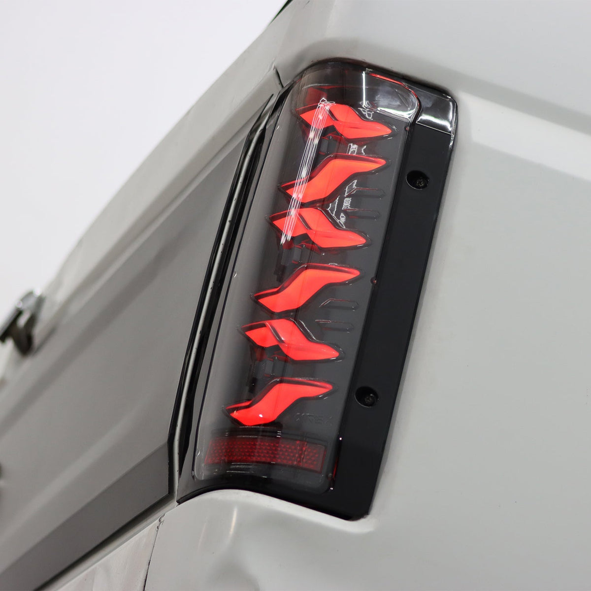 AlphaRex 658007 87-96 Ford Bronco/F-150 Luxx-Series LED Tail Lights - Black Red