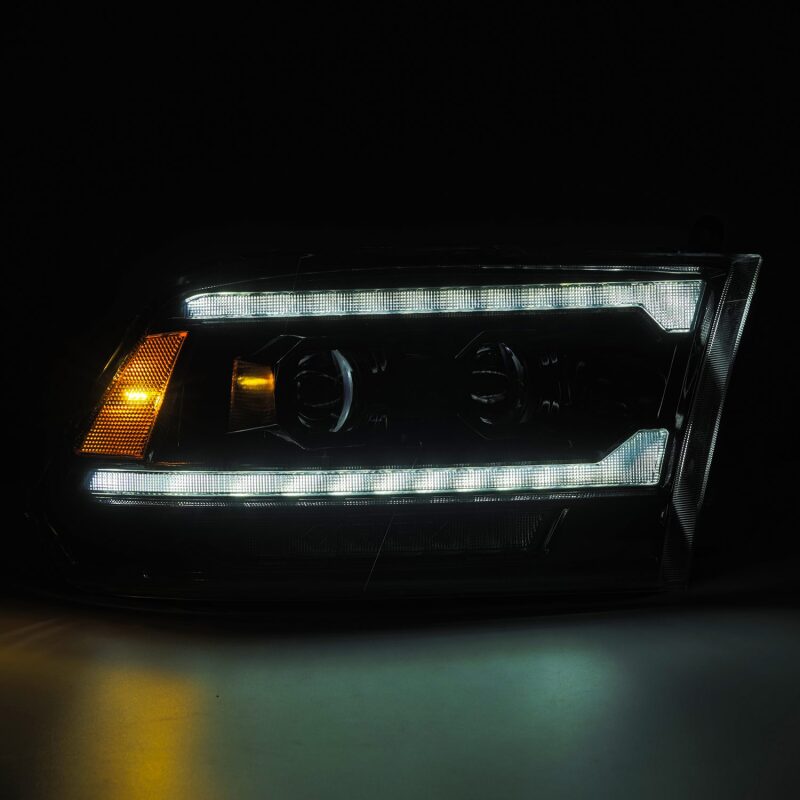 AlphaRex 880563 09-18 RAM 1500 PRO-Series Projector Headlights Alpha-Black w/Sequential Signal & Top/Middle DRL
