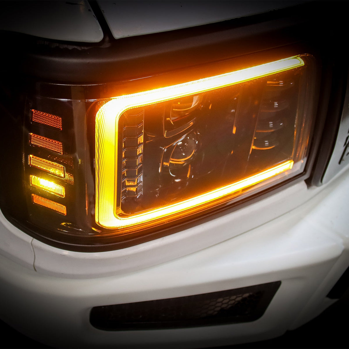 AlphaRex 880266 92-96 Ford F-Series/Bronco PRO-Series Projector Headlight Black with Sequential Signal & DRL