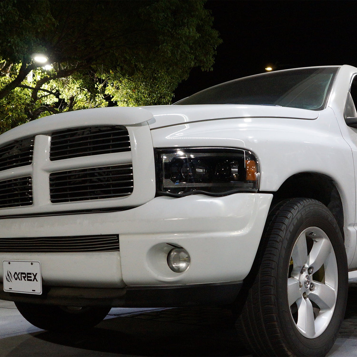 AlphaRex 880570 02-05 Dodge Ram 1500 PRO-Series Projector Headlights Plank Style Black with Sequential Signal