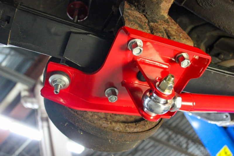 UMI Performance 262824-R Leaf Spring Traction Bars with Mounts Red